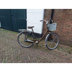 Batavus luca dx met geveerde voorvork en zadelpen.stuurslot