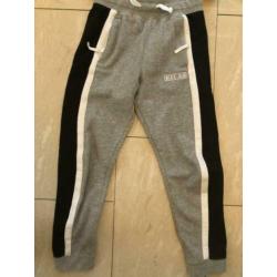Nike Air trainingspak maat 152