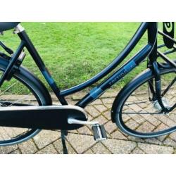 Fietshokje Haarlem: Cortina U4 transport damesfiets D54 N8