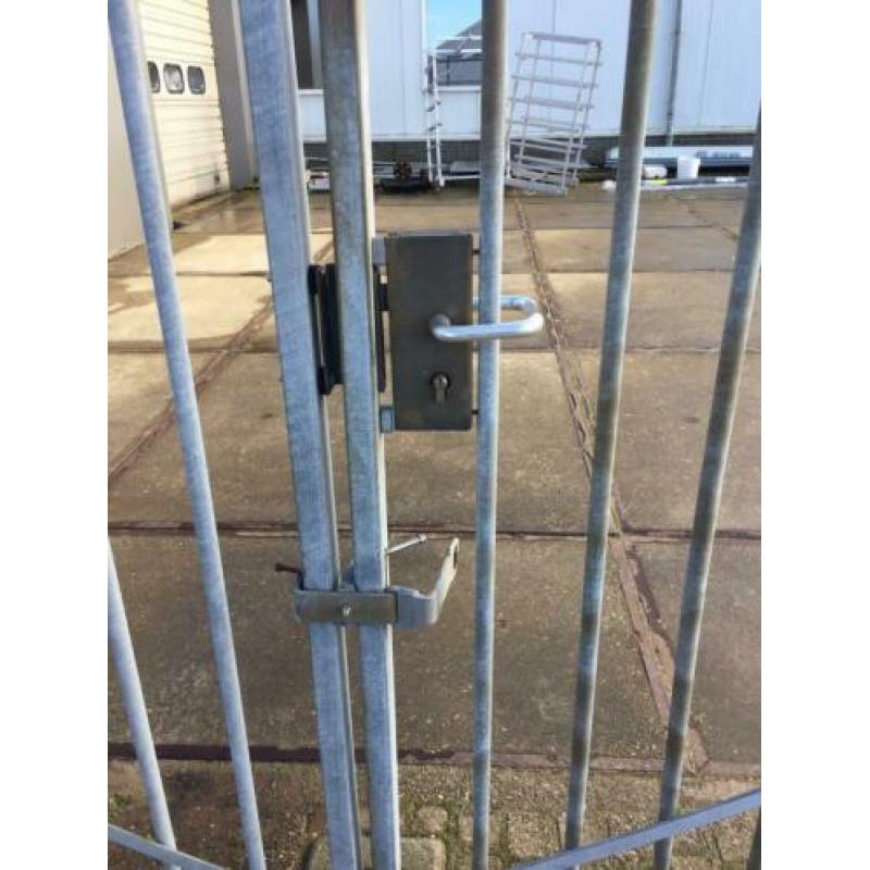 Heras poort draaipoort 7 meter.