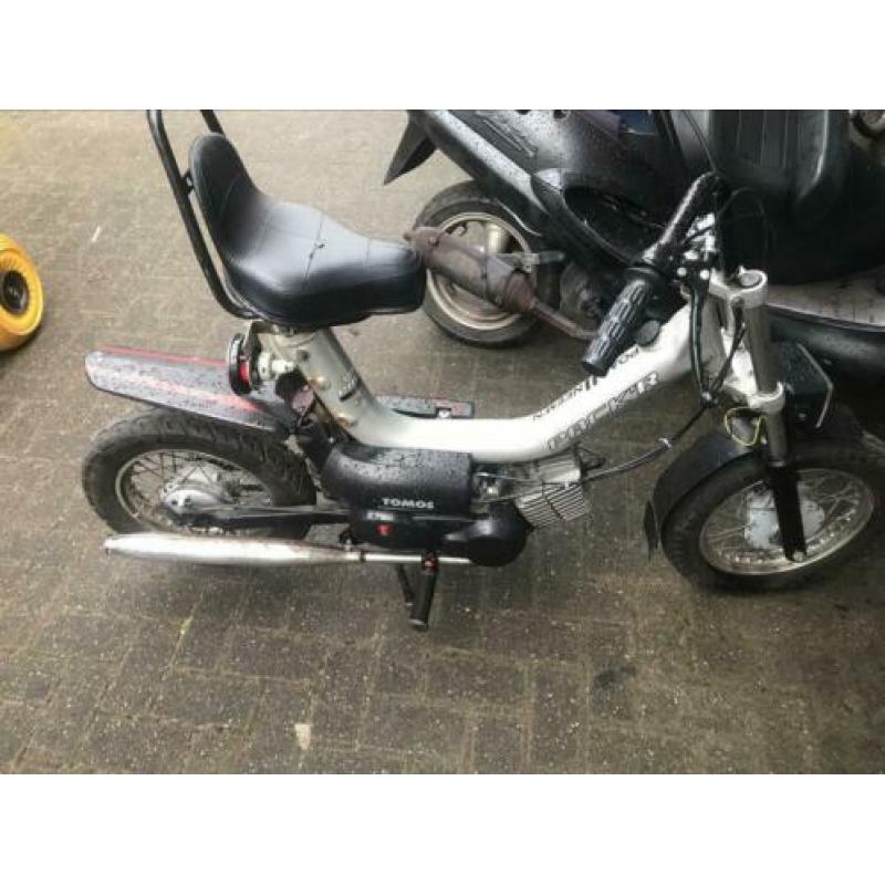 Tomos