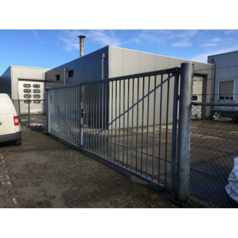 Heras poort draaipoort 7 meter.