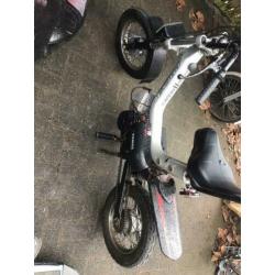 Tomos