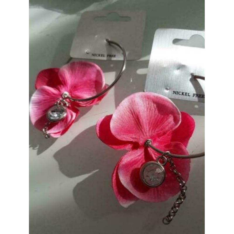 o019 zilverkleurige ringen met bloem