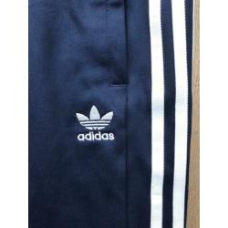 Adidas trainingsbroek met knopen aan de zijkant