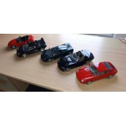 Te koop 14 modelauto's Bburago en Maisto 1:18