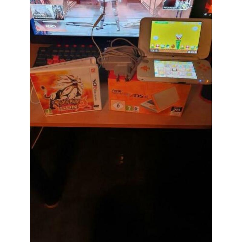 New Nintendo 2ds xl + pokemon sun + oplader + originele doos