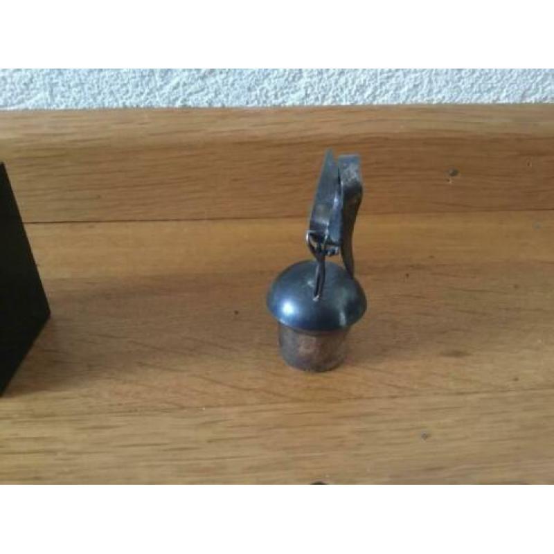 Corry Ammerlaan beelden en flessenstoppers