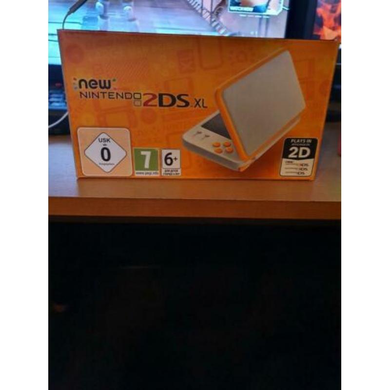New Nintendo 2ds xl + pokemon sun + oplader + originele doos