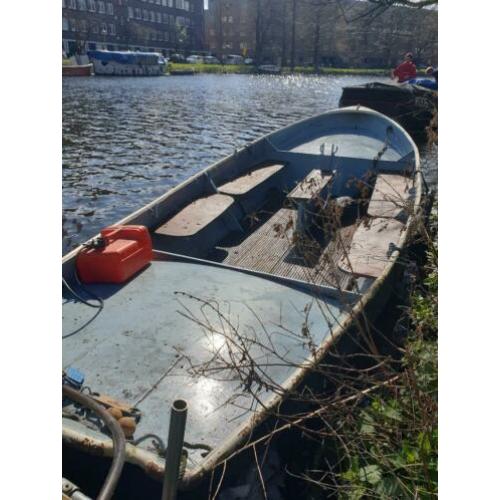 Stalen sloep - motorboot - lelievlet