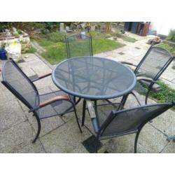 Tuinset 4 stoelen, ronde tafel en voetenbankje