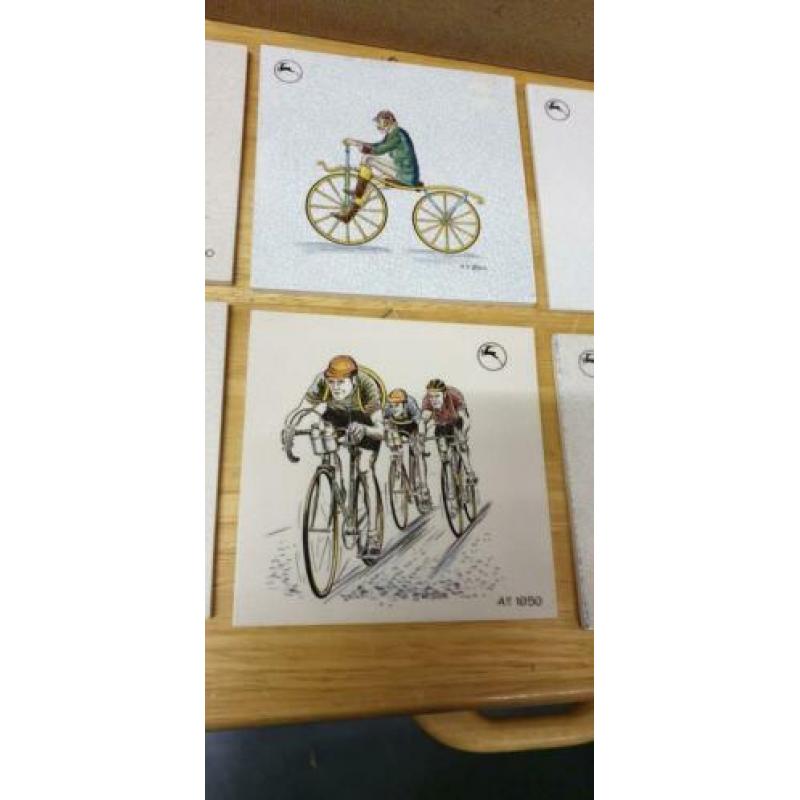 Diverse tegels Van Gazelle fietsen.