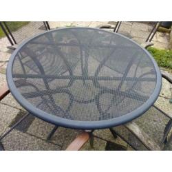Tuinset 4 stoelen, ronde tafel en voetenbankje
