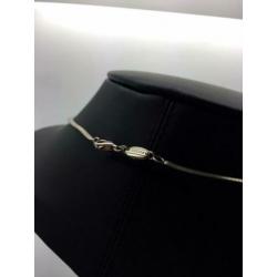 H980 Prachtige zilveren Fossil ketting met modernist hanger