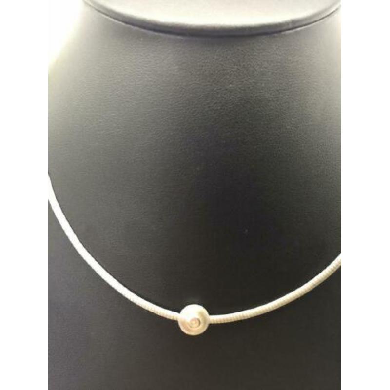 H980 Prachtige zilveren Fossil ketting met modernist hanger